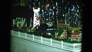 1951: an electric train set under the christmas tree CLEVELAND, OHIO