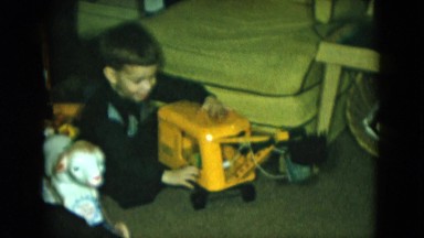 1951: boy playing with toy front loader CLEVELAND, OHIO