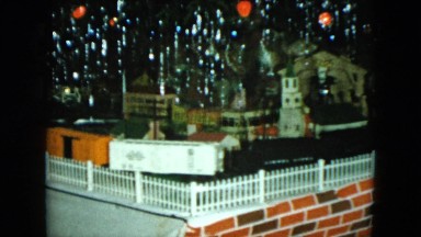 1951: a train moving on a track under a christmas tree CLEVELAND, OHIO