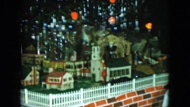 1951: a beautiful toy train moving around model city with buildings CLEVELAND