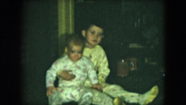 1951: two kids are sitting on the floor CLEVELAND, OHIO