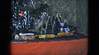 1951: train going around a christmas tree CLEVELAND, OHIO