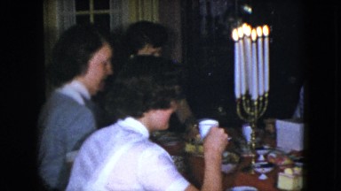 1951: people seated around a dining room table having dinner CLEVELAND, OHIO