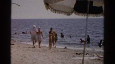 1957: loving this time on the beach. CATSKILL, NEW YORK
