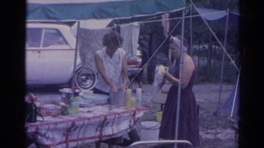 1962: Women Having a Friendly Conversation Cleaning While Their Kids Play