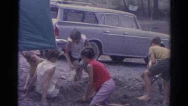 1962: Several Children Burying a Lady in the Sand at Catskill Beach