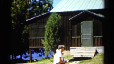 1962: People Gathering Outside a Beautiful Wooden Cabin in Catskill, New York