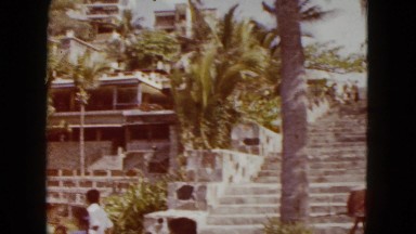 1962: tropical city landscape with houses built into the hills MEXICO