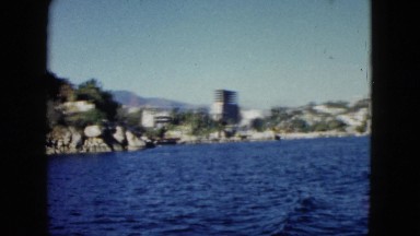 1962: a stunning view of the hills and mountains as seen from a moving vessel