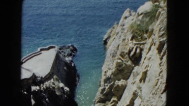 1962: a beautiful, rugged mountain against a large body of water MEXICO