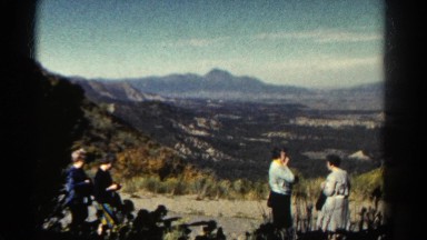 1967: Four People Enjoying Panoramic Mountain View in Colorado