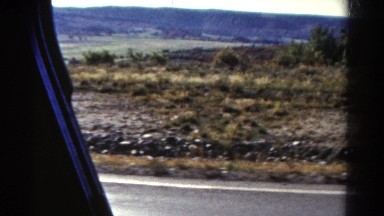 1967: someone slowly drives on a highway enjoying the view on a scenic drive.