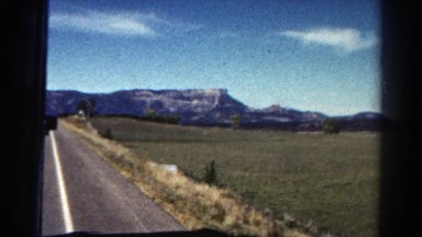 1967: majestic mountain in the distance during a road trip COLORADO