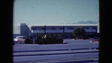 1959: panoramic view of las vegas strip and attractions, hotels, and parking