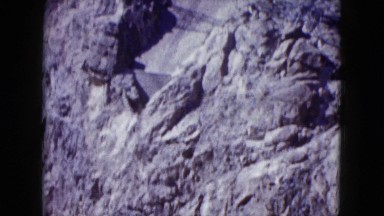 1959: a view of water churning in a dam in a rugged canyon wall ARIZONA