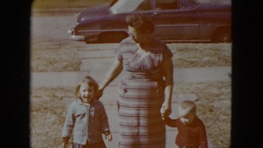 1959: a family strolling around the neighborhood