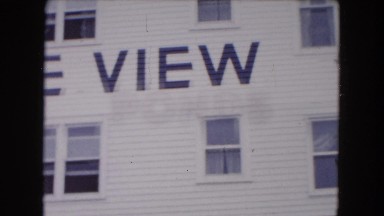 1961: a mother with her two children coming out of a hotel MICHIGAN