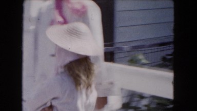 1961: two girls in matching hats and jackets playing on a sidewalk MICHIGAN