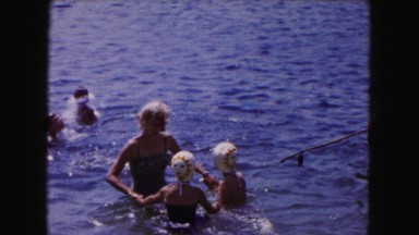 1961: kid swimming pool freestyle move fast water waves MINNESOTA