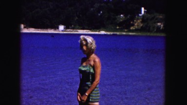 1961: a white blond woman by the pool MINNESOTA