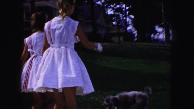 1961: playing with our lovely pet mr.charlie in summertime MINNESOTA