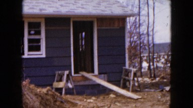 1954: people visiting a cabin under construction near the lagoon HICKSVILLE