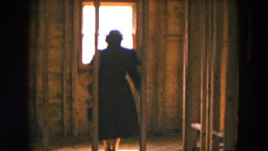 1954: woman and child walking in unfinished house looking out window HICKSVILLE