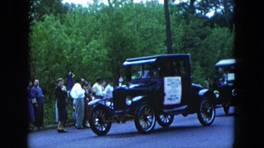 1954: parade car moving black heavy drive down lane HICKSVILLE, NEW YORK