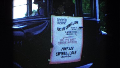 1954: antique car door is a sign for fort lee savings & loan HICKSVILLE, NEW