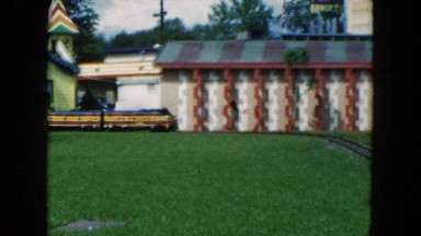 1954: people riding a miniature train at an amusement park HICKSVILLE, NEW YORK