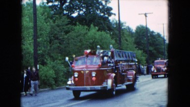 1954: the vintage fire engine parade comes to a halt due to breakdown.