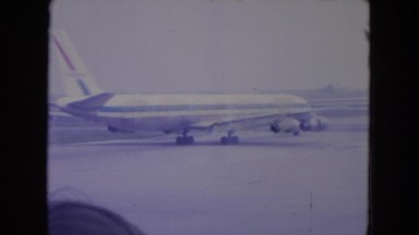 1972: Airplanes at Airport Taxi Across Runway Before Takeoff Wisconsin