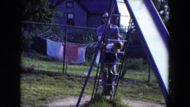 1954: Father Plays With Daughter On Slide In Backyard, Hicksville, New York