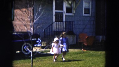 1955: Two Little Girls in Front of a House in Hicksville, New York