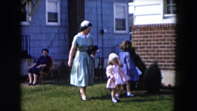1955: A Mother and Her Two Daughters Dressed to Visit Neighbor in Hicksville, NY