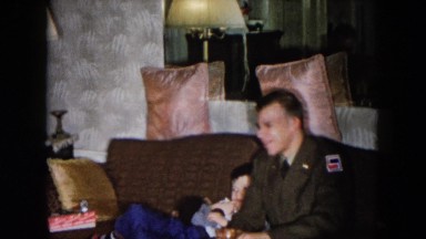 1955: indoor party drinks talk dressed packing family HICKSVILLE, NEW YORK