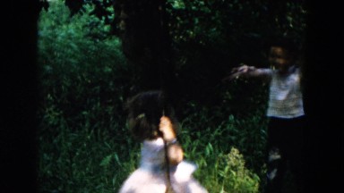 1955: swing kids rope play garden enjoy HICKSVILLE, NEW YORK
