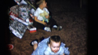 1958: cute girl dress lie down toddler NEVADA