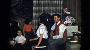 1958: a family gathers around together. NEVADA