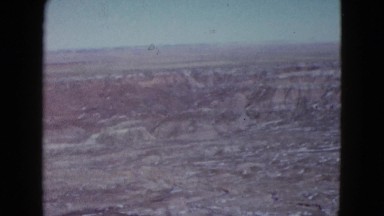 1958: a building and cars in a state park, perhaps the grand canyon NEVADA