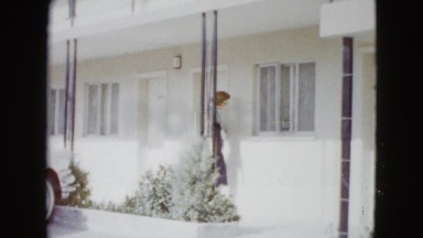 1958: a beautiful lady walking along the veranda and getting out NEVADA