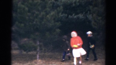 1964: Children Participating in Traditional Easter Egg Hunt California