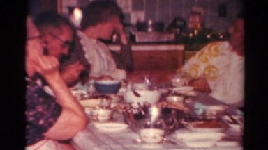 1964: indoor party drinks talk dressed packing family CALIFORNIA