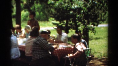 1964: retro family of multiple generations dining in a park CALIFORNIA