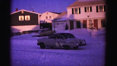 1967: people experience winter and a man shovels. HAGERSTOWN, MARYLAND