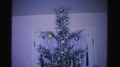 1967: christmas tree with tinsel and colored balls by window HAGERSTOWN