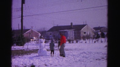 1967: snowman making man open wide ice cold HAGERSTOWN, MARYLAND