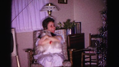 1967: people opening a surprising sweater with tissue paper