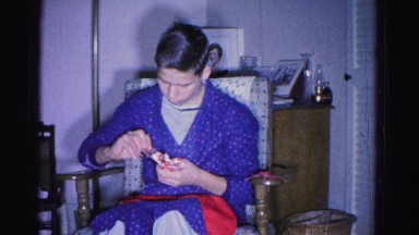 1967: a boy wrapped his christmas gift from a christmas sock HAGERSTOWN