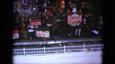 1951: A Toy Train Circling Underneath a Christmas Tree in Cleveland, Ohio